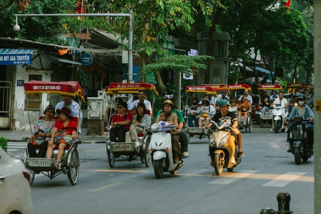 cyclos and motorcycles in Hanoi