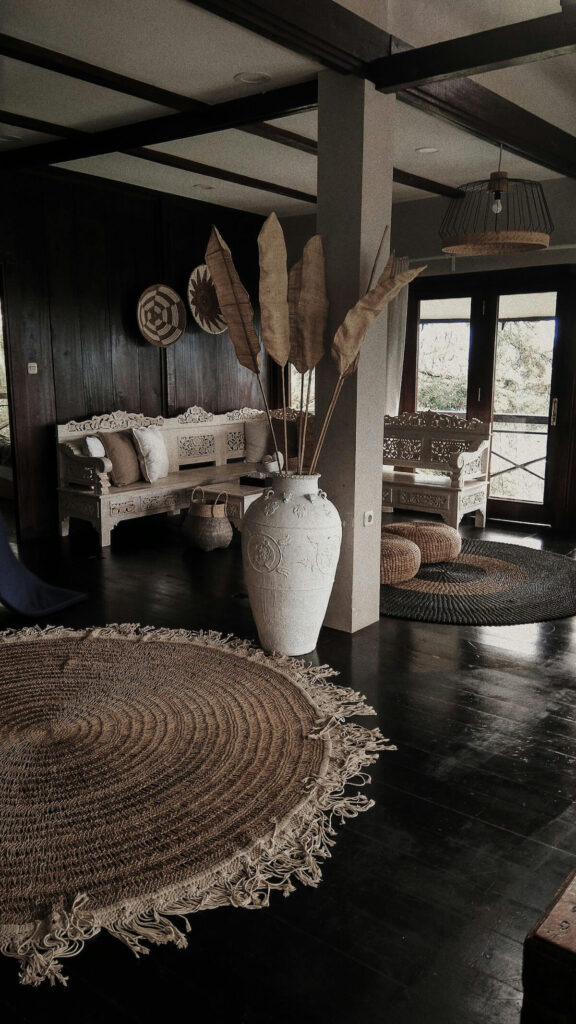 inside Indonesian house, featuring woven mats