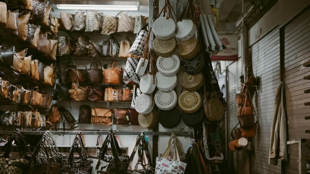 woven bags on display in a store in Yogyakarta