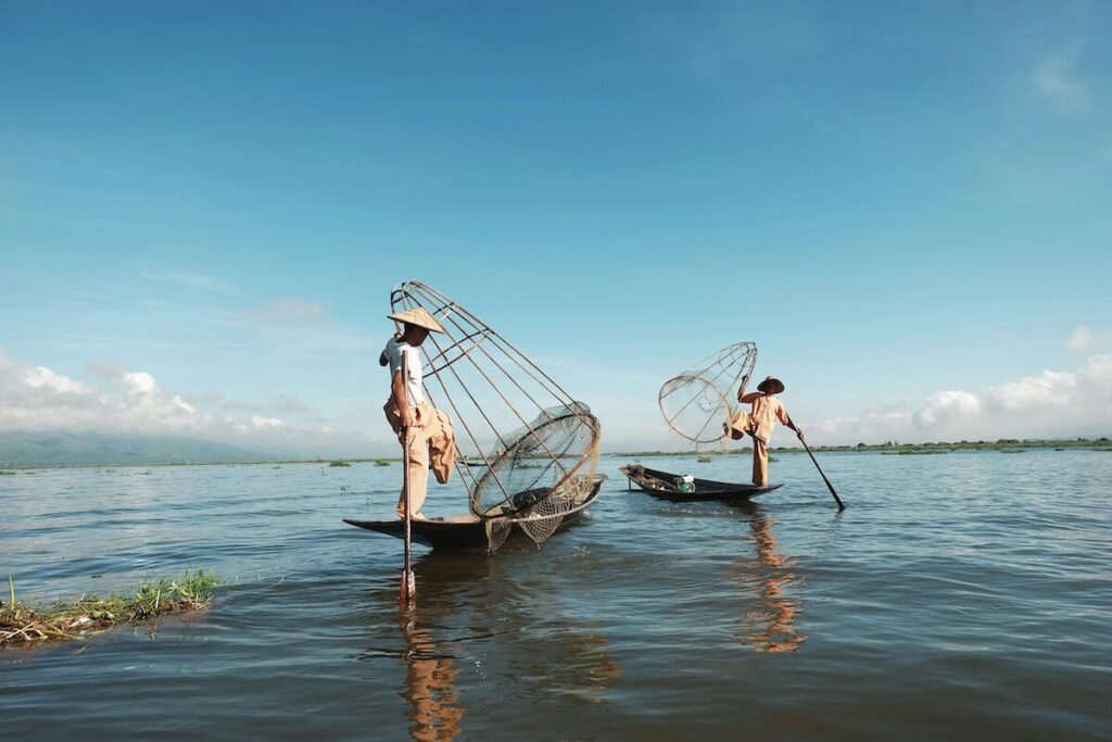 two one-legged rowers at Inle Lake