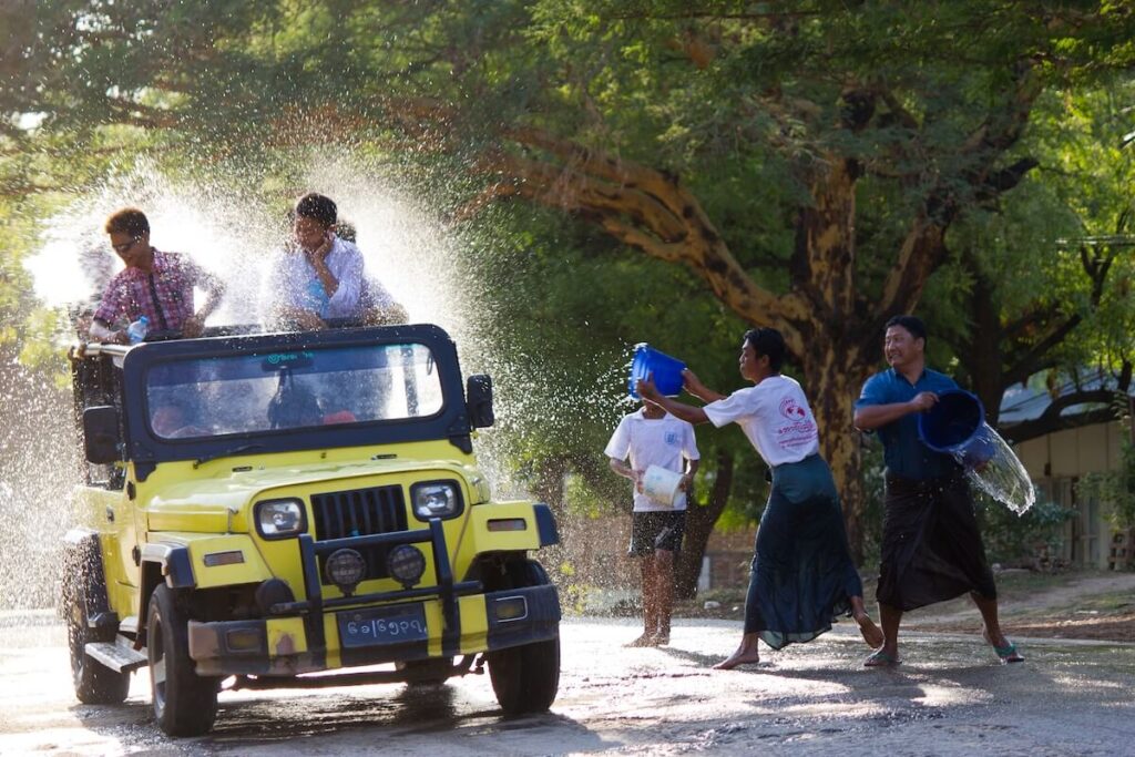 people throwing buckets of water during Thingyan in Myanmar