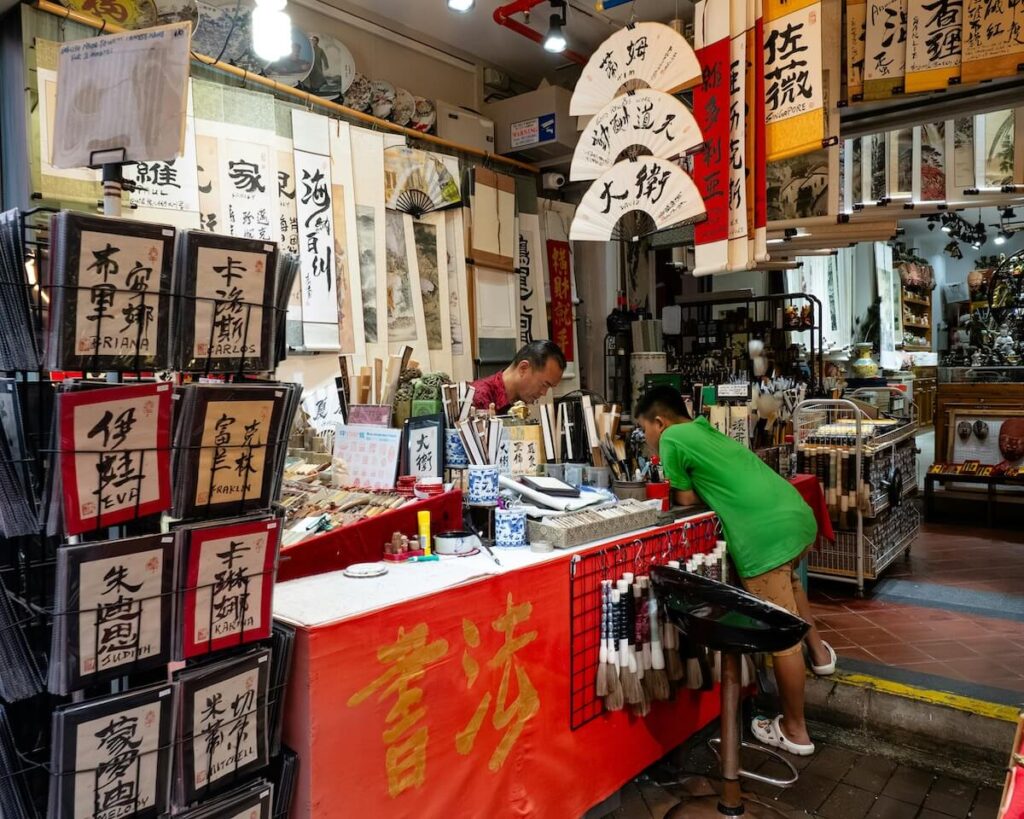 stall selling Chinese calligraphy scrolls