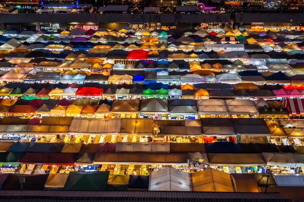 rows of stalls in Bangkok night market