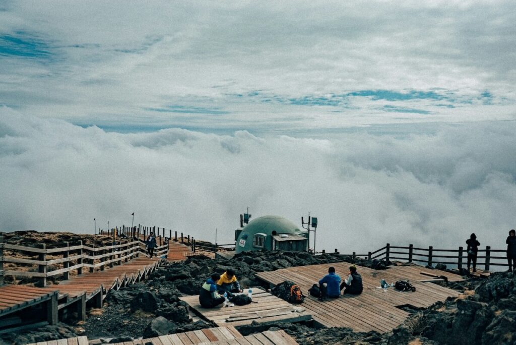 hikers at the peak of Hallasan
