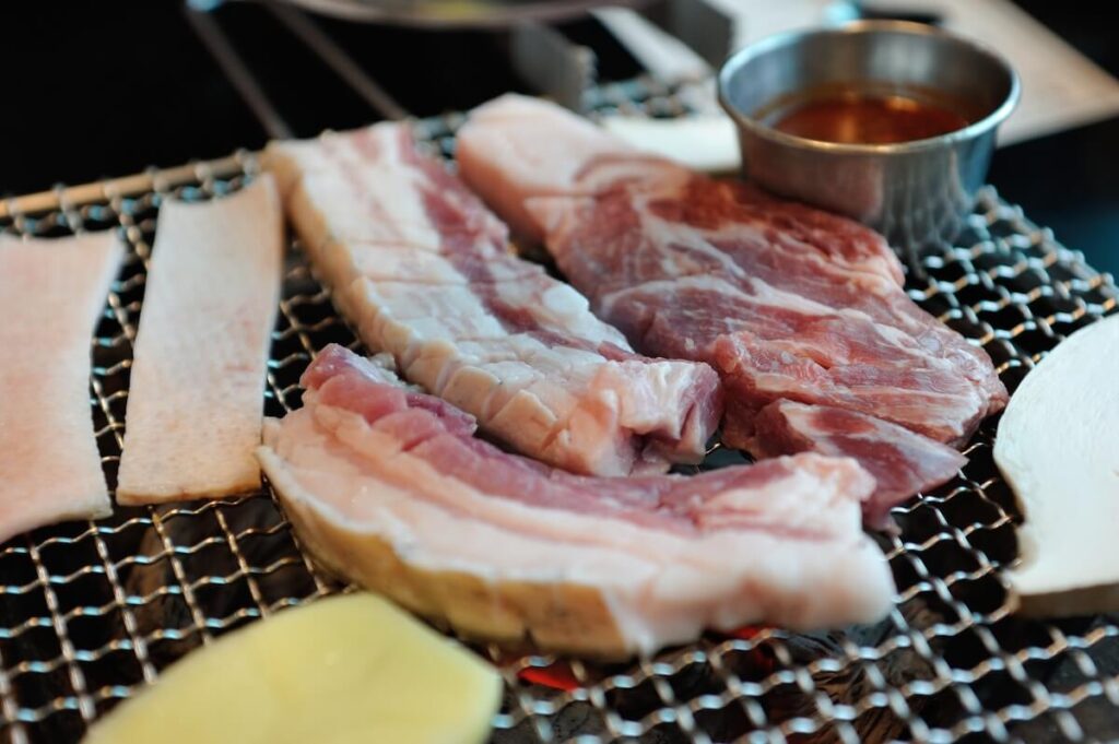 closeup of Jeju black pork in grill