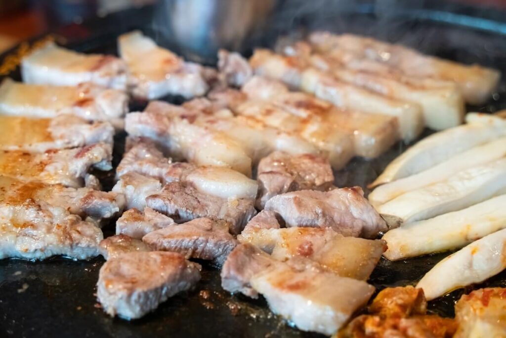 close up of Jeju black pork on a grill