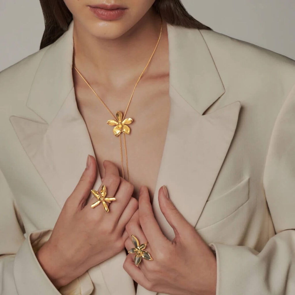 woman wearing RISIS jewelry