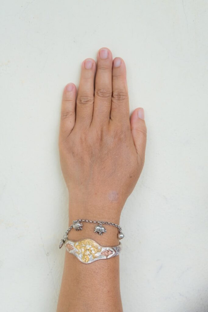 woman wearing Thai silver jewelry