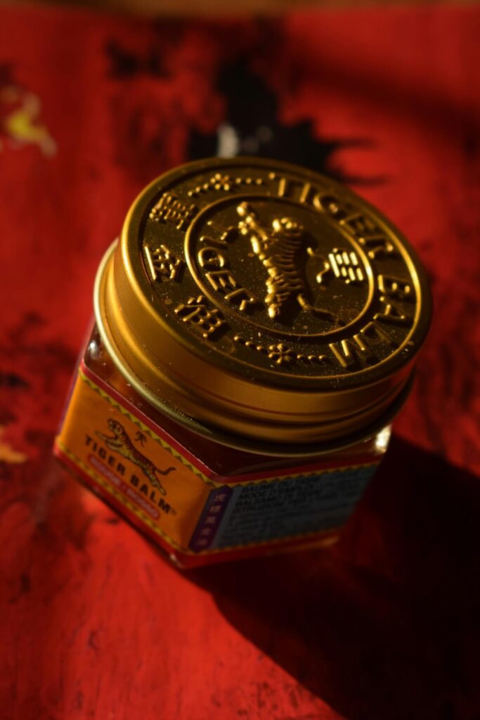 close up of Tiger Balm on red cloth