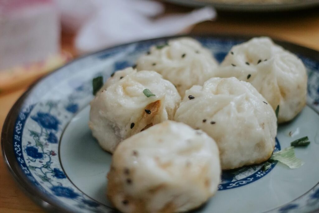 plate with pieces of sheng jian bao
