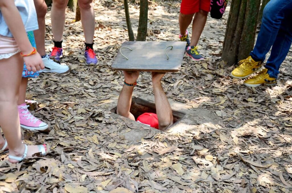 person at the entrance of the Cu Chi Tunnel