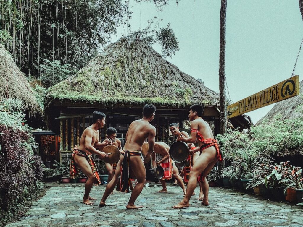 ethnic people dancing in Tam-awan Village