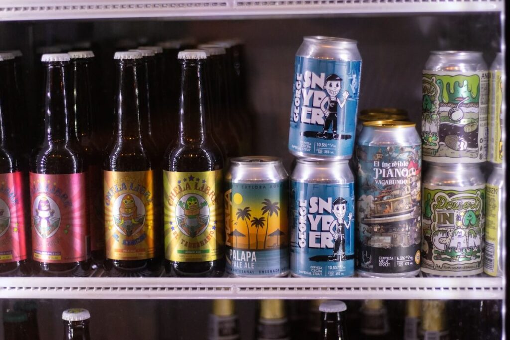 assorted bottles and cans of beers