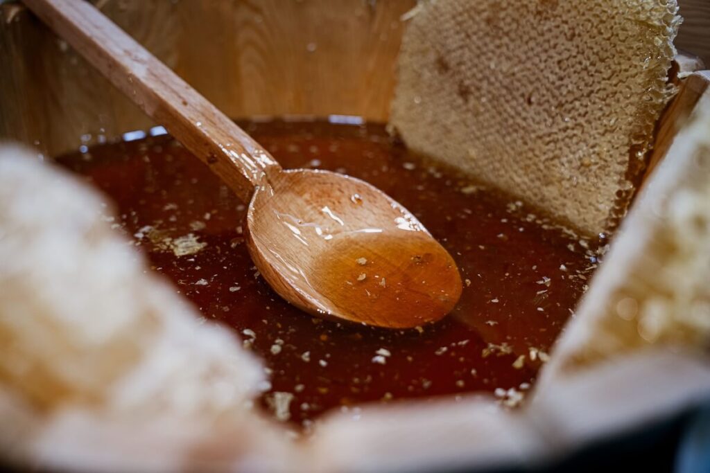 closeup of honey with spoon