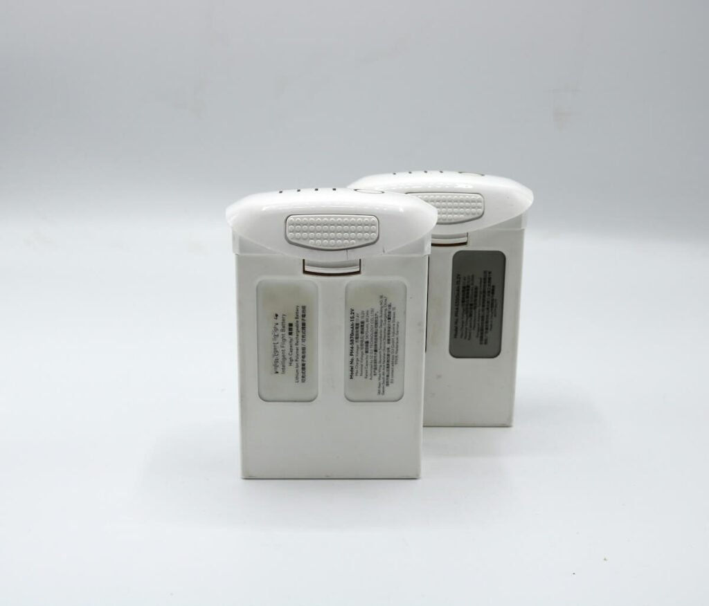 white spare batteries for drone camera