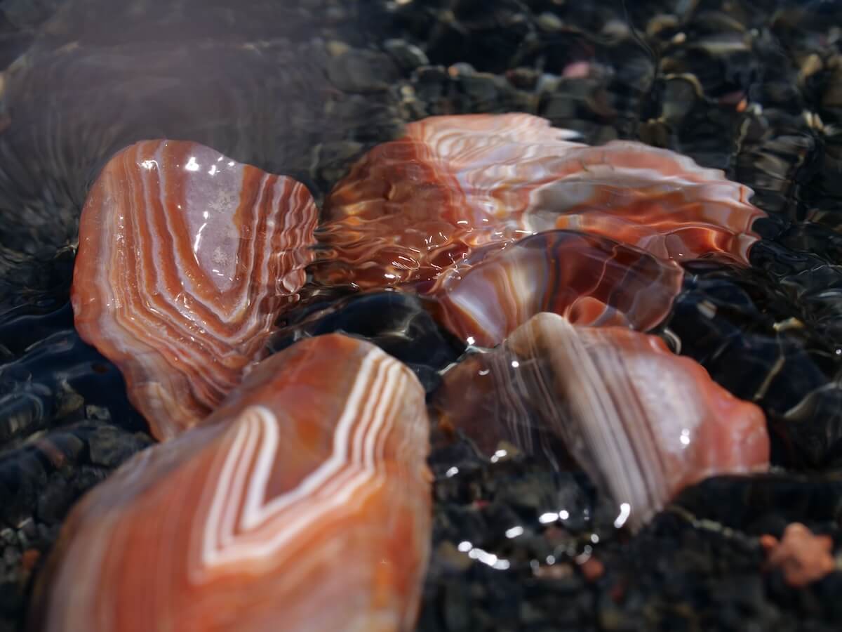 agate rocks submerged on the Lake Superior
