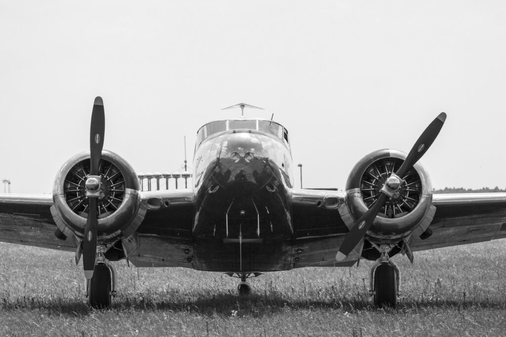 black and white photo of a Beechcraft C45 Twinbeech manufactured by the Beech Aircraft Corporation of Wichita, Kansas