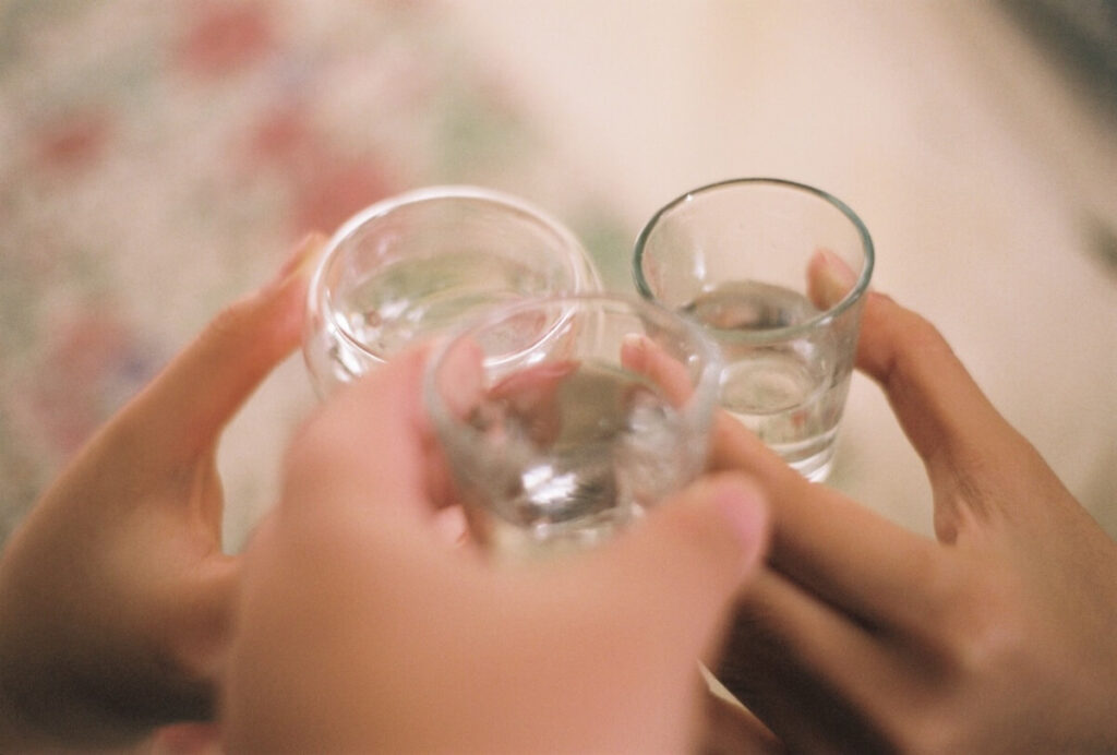 three glasses clinking