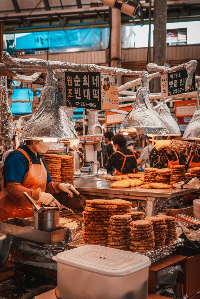 pile of bindaetteok for sale at Gwangjang Market