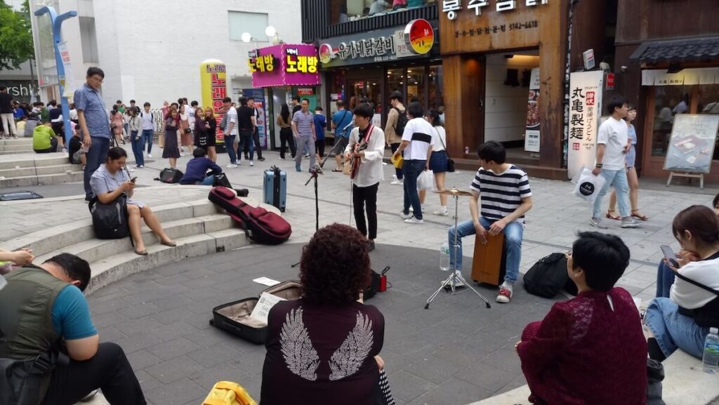 musician busking in Hongdae