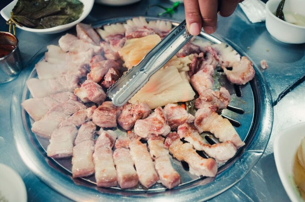 man grilling Korean barbecue