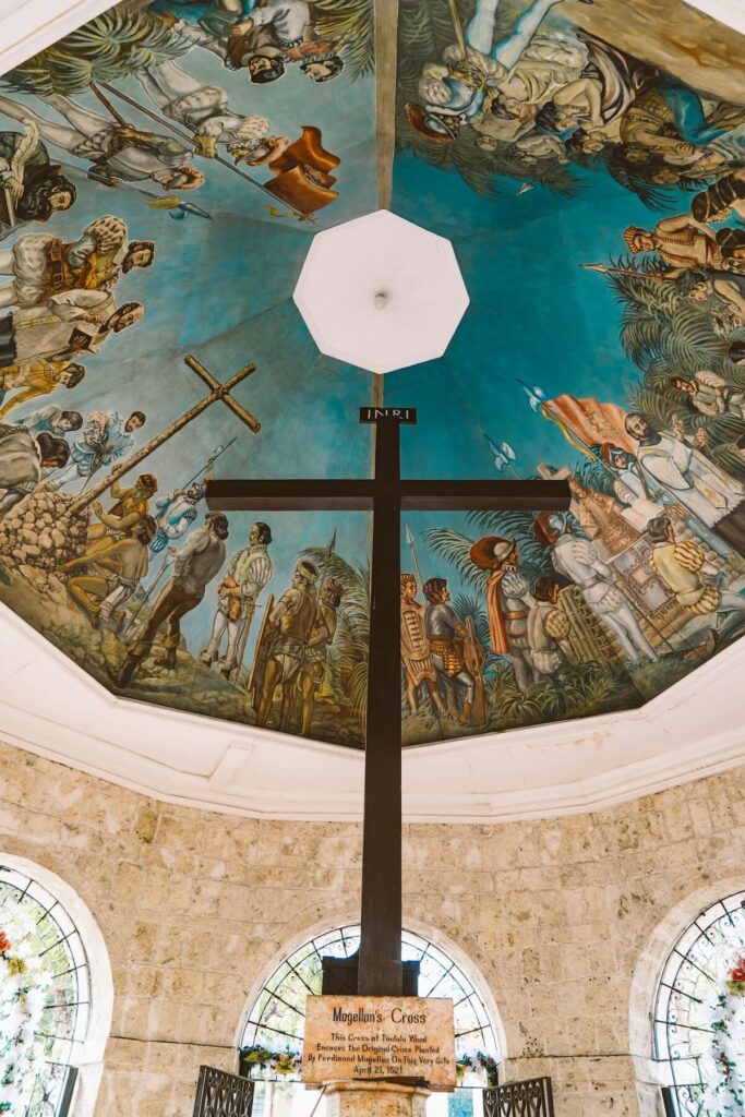 worm's eye view of Magellan's Cross and ceiling