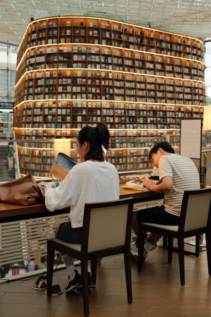 man and woman reading and studying at the Starfield Library