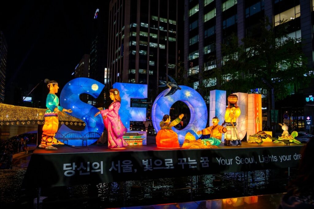 neon sign spelling out Seoul