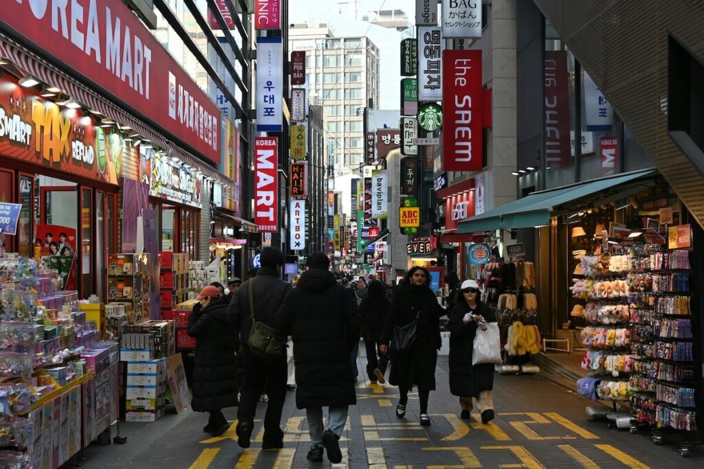 people in a shopping street in seoul
